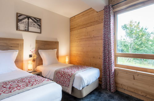 Foto 15 - Appartamento con 2 camere da letto a Fontcouverte-la-Toussuire con piscina e vista sulle montagne