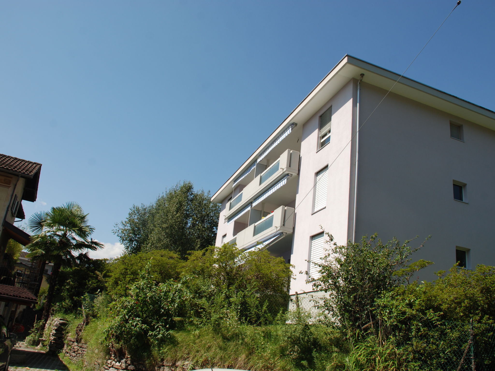 Photo 1 - Appartement de 2 chambres à Minusio avec jardin et vues sur la montagne