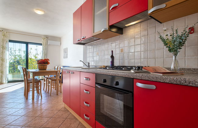 Apartamento de 3 quartos em Trinità d'Agultu e Vignola com piscina e jardim - Foto 11