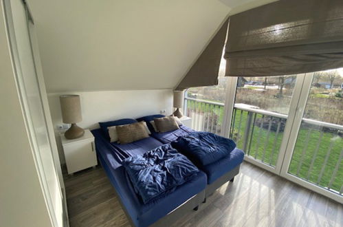 Foto 4 - Haus mit 5 Schlafzimmern in Biddinghuizen mit schwimmbad und terrasse