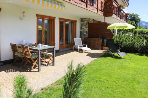 Foto 2 - Apartamento de 2 quartos em Crans-Montana com jardim e terraço