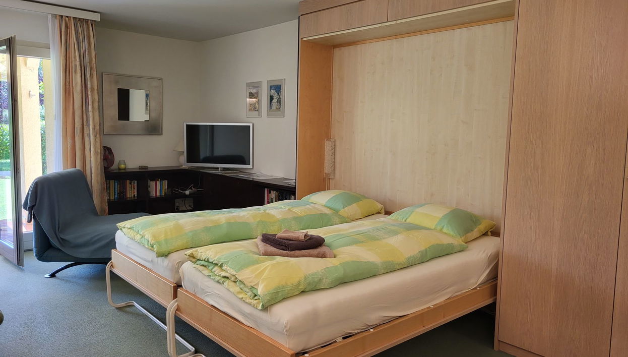 Apartamento de 1 quarto em Caslano com jardim - Foto 1