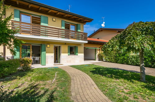 Foto 38 - Casa con 3 camere da letto a Lignano Sabbiadoro con piscina e vista mare