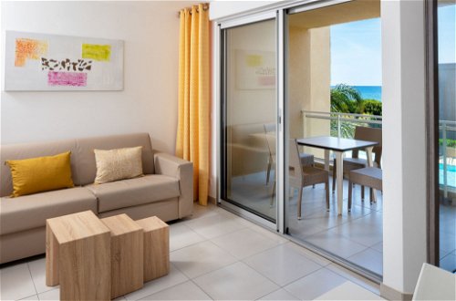 Foto 3 - Appartamento con 1 camera da letto a Santa-Lucia-di-Moriani con piscina e vista mare