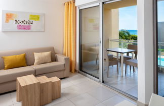 Foto 3 - Apartamento de 1 habitación en Santa-Lucia-di-Moriani con piscina y vistas al mar