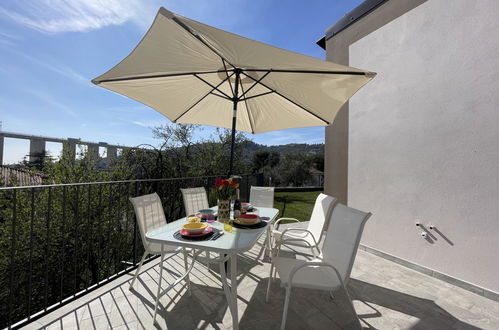 Photo 2 - Maison de 1 chambre à Imperia avec jardin et terrasse