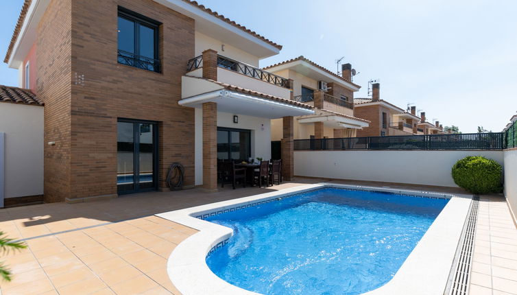 Foto 1 - Casa de 4 habitaciones en Castelló d'Empúries con piscina privada y jardín