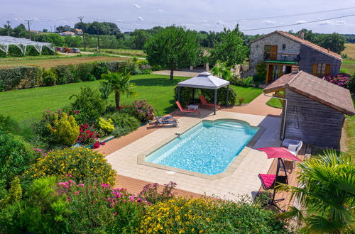 Foto 1 - Casa con 2 camere da letto a Madaillan con piscina privata e giardino