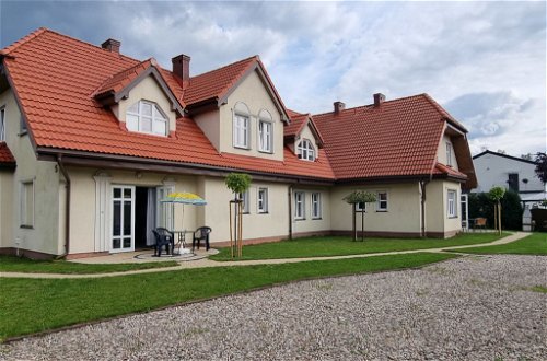 Foto 16 - Casa con 2 camere da letto a Łeba con giardino e vista mare