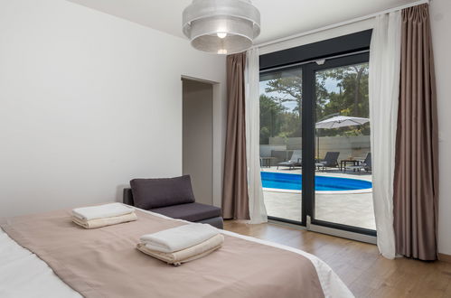 Foto 15 - Casa con 3 camere da letto a Lopar con piscina privata e vista mare