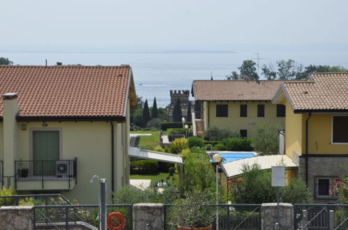 Foto 18 - Apartamento de 2 habitaciones en Lazise con piscina y vistas a la montaña