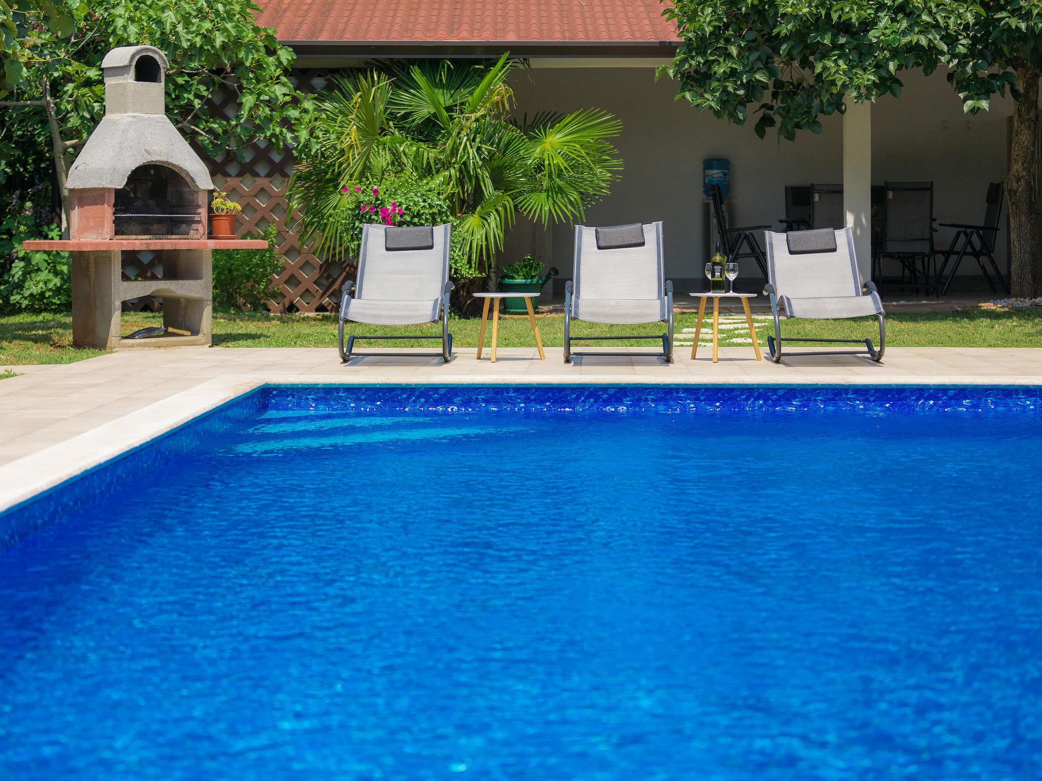 Foto 46 - Casa de 7 quartos em Umag com piscina privada e jardim