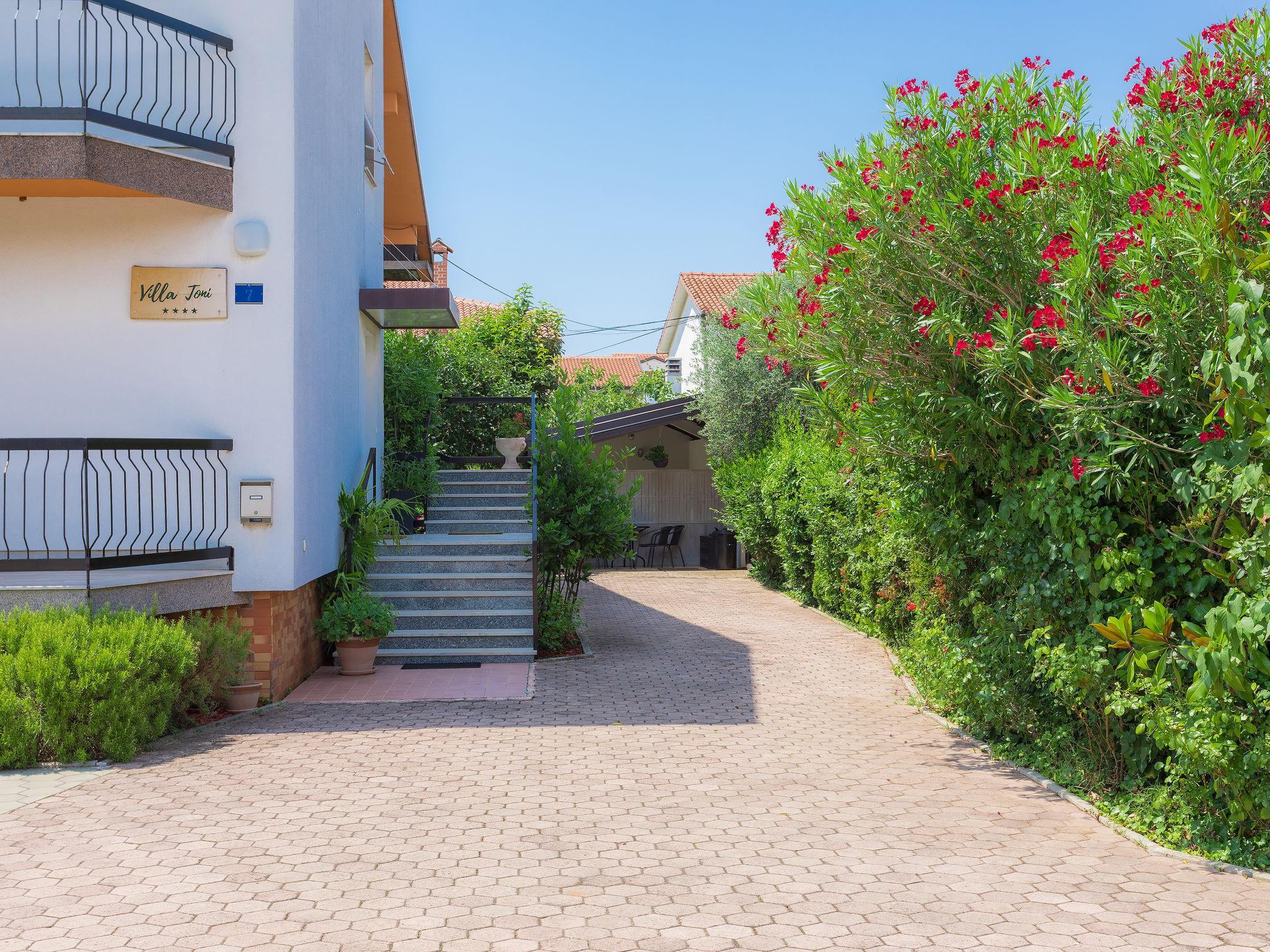 Foto 47 - Casa de 7 habitaciones en Umag con piscina privada y jardín