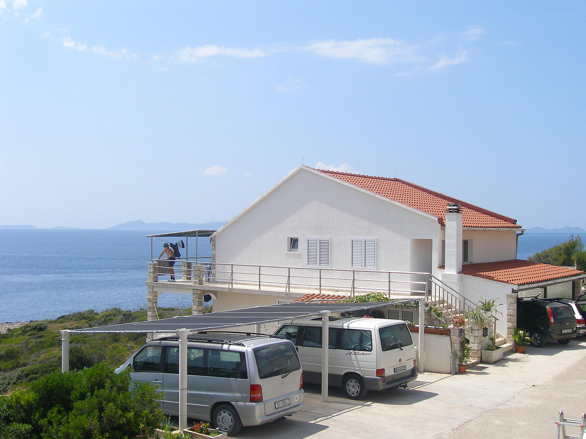 Foto 1 - Appartamento con 2 camere da letto a Korčula con piscina e vista mare