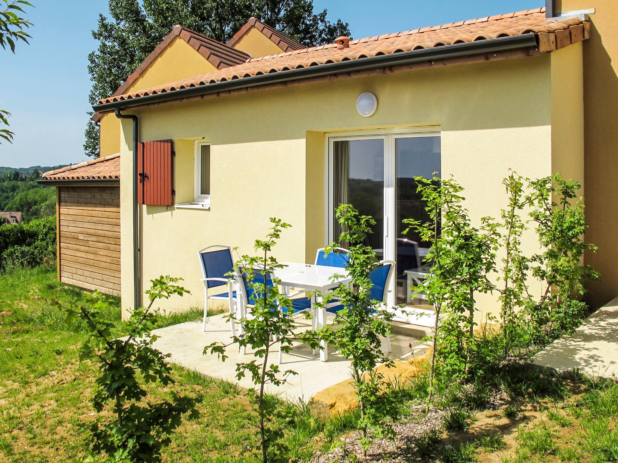 Foto 6 - Haus mit 1 Schlafzimmer in Sarlat-la-Canéda mit schwimmbad und terrasse