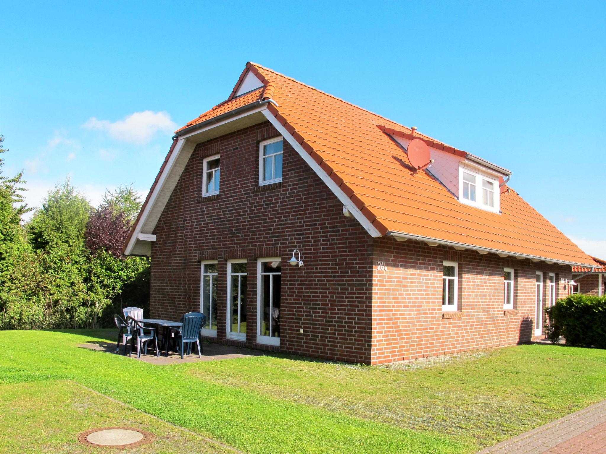 Photo 1 - Maison de 3 chambres à Butjadingen avec jardin et terrasse