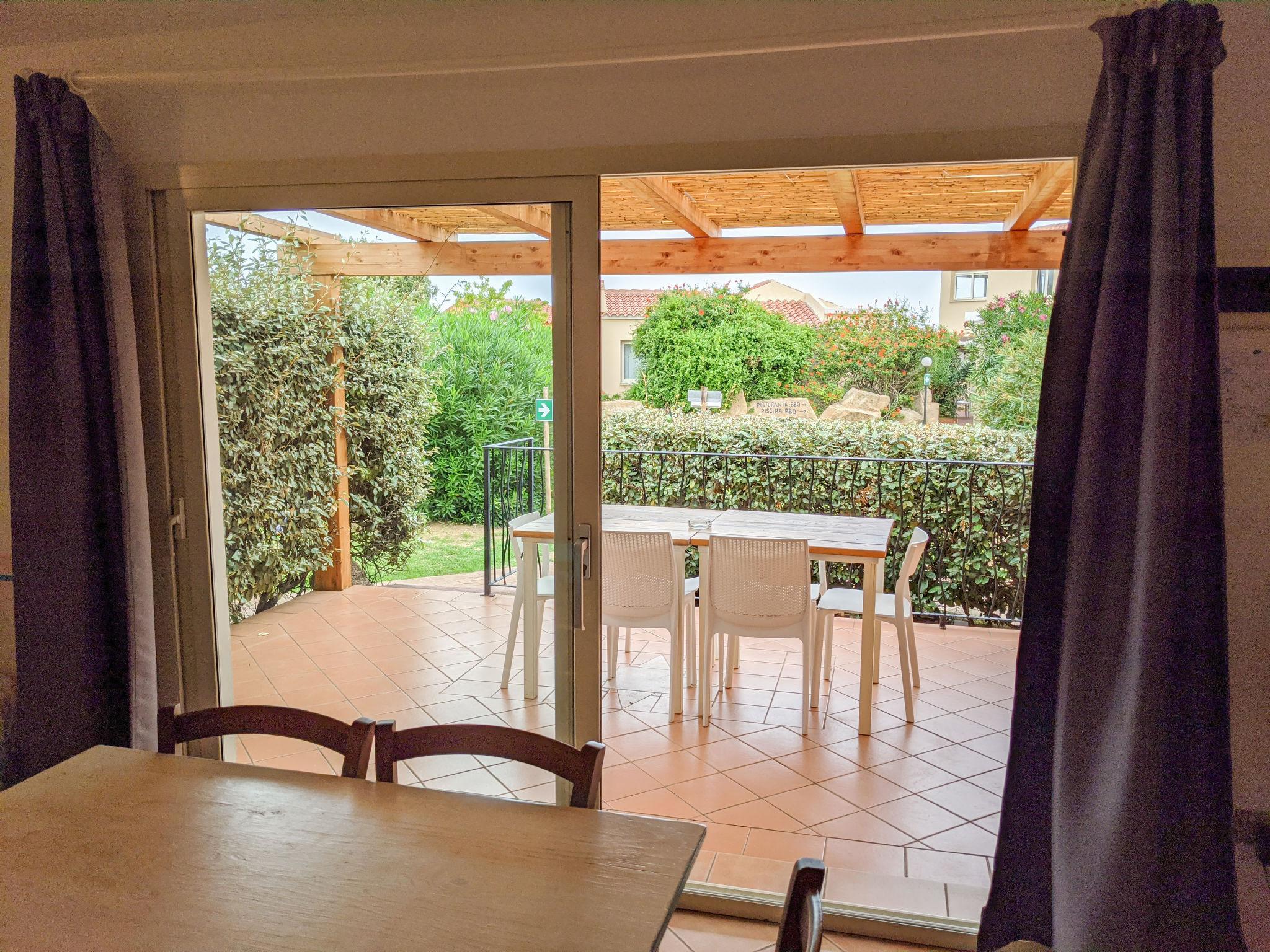 Foto 6 - Appartamento con 2 camere da letto a San Teodoro con piscina e giardino