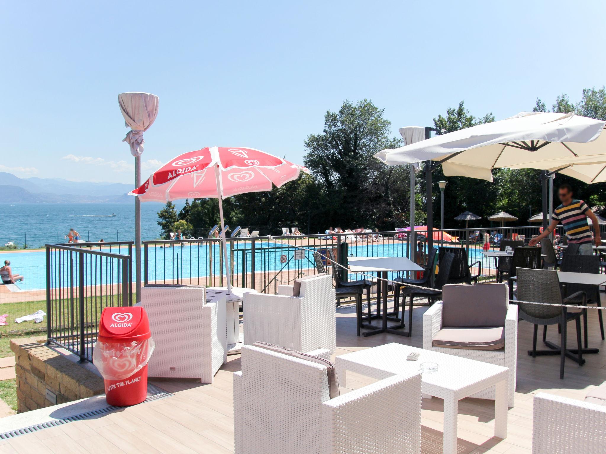 Photo 5 - Maison de 2 chambres à Manerba del Garda avec piscine et vues sur la montagne