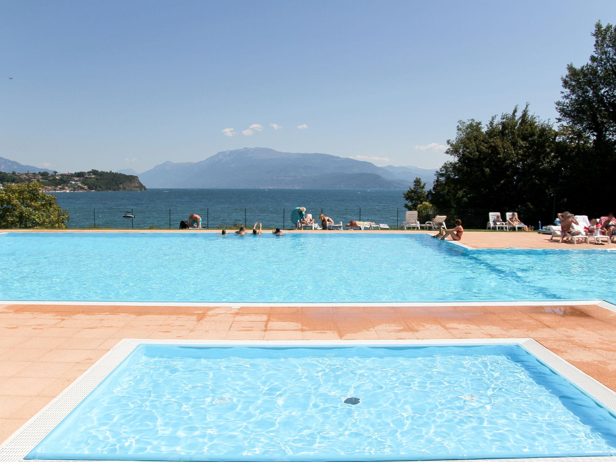 Foto 1 - Casa de 2 quartos em Manerba del Garda com piscina e vista para a montanha