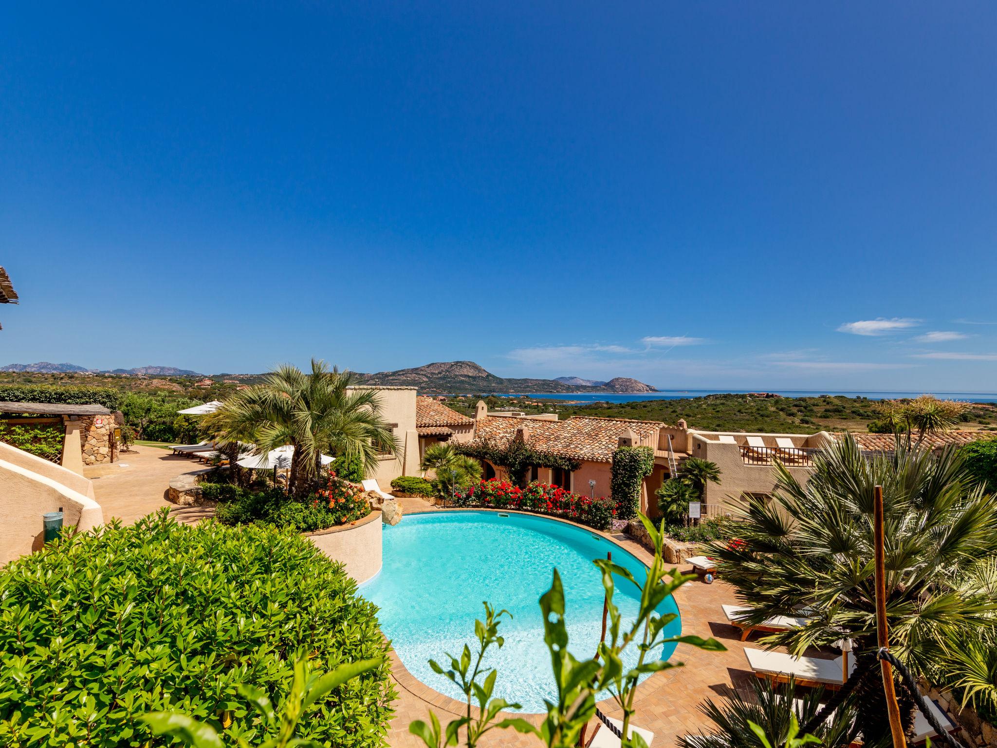 Foto 1 - Casa de 2 quartos em Loiri Porto San Paolo com piscina e jardim