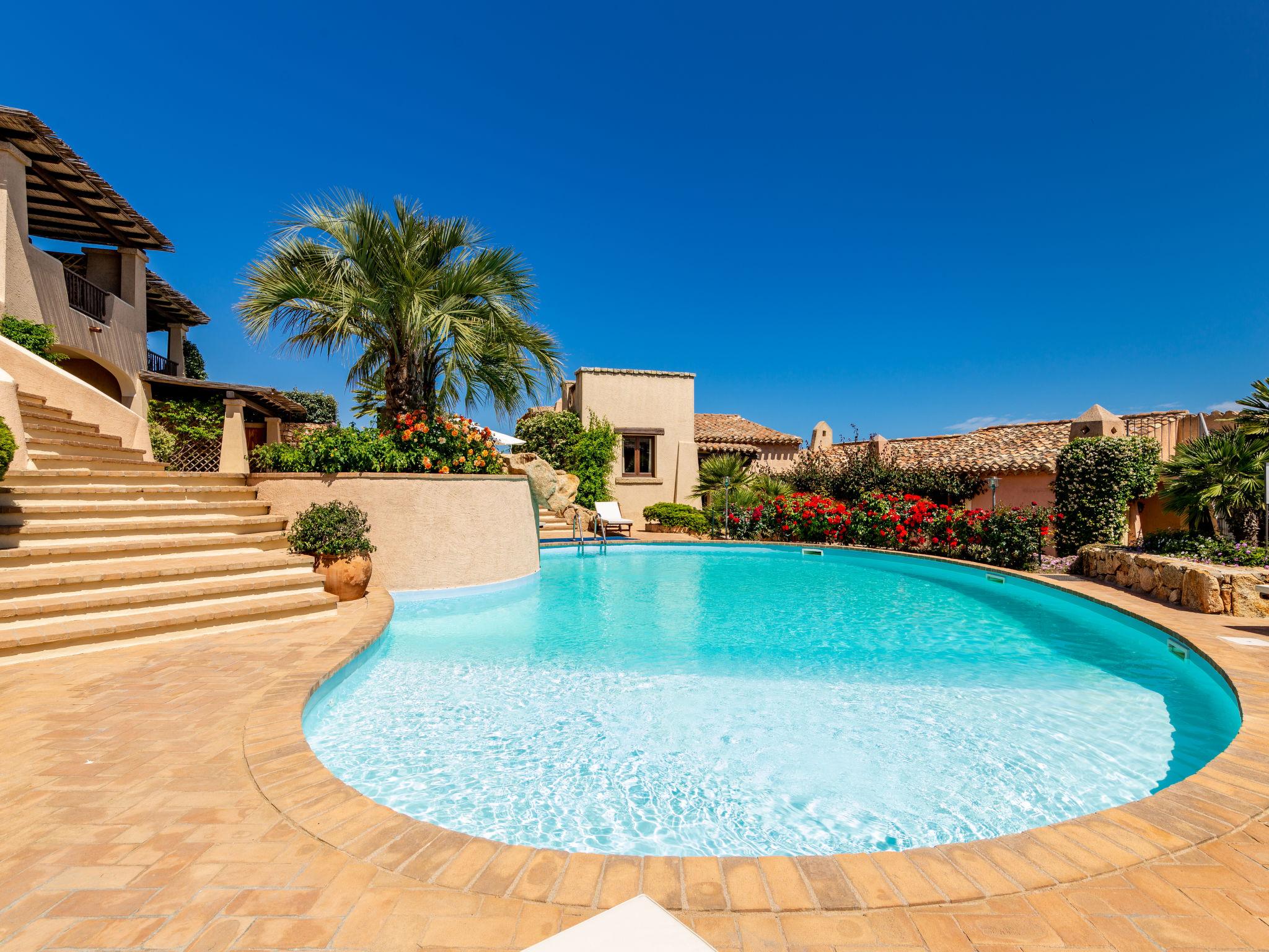 Photo 1 - Maison de 2 chambres à Loiri Porto San Paolo avec piscine et vues à la mer