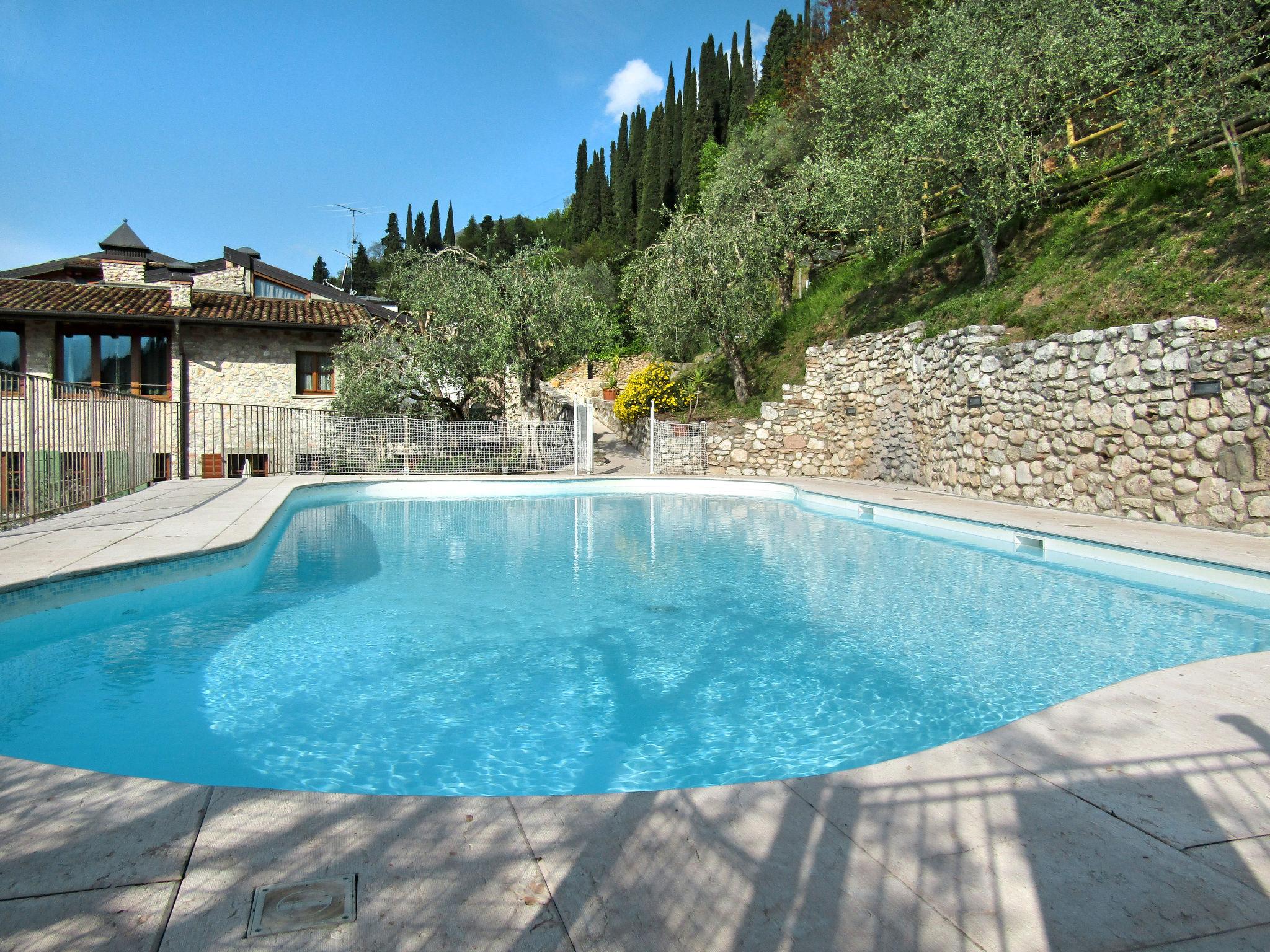Photo 17 - Appartement de 2 chambres à Toscolano Maderno avec piscine et vues sur la montagne