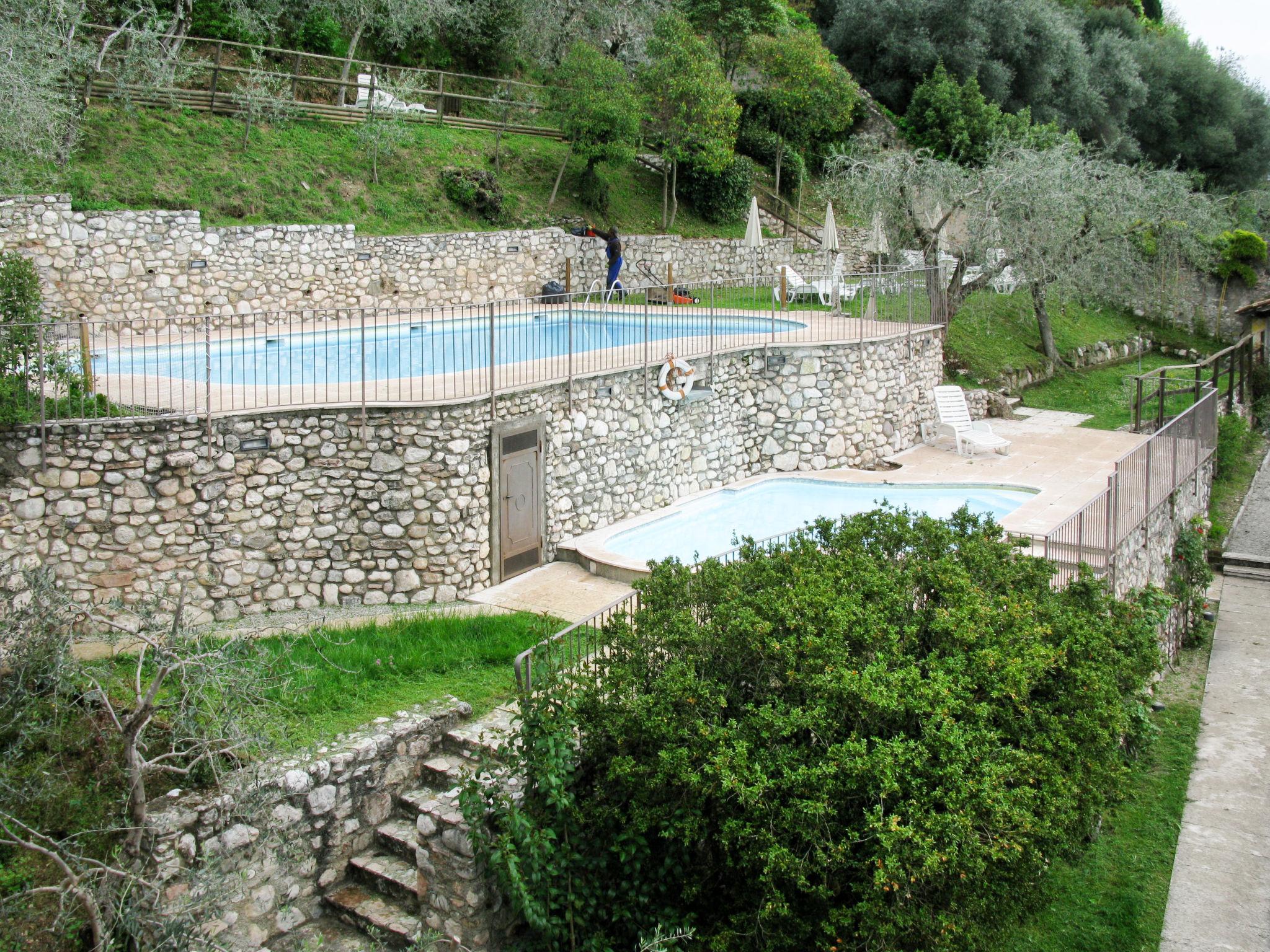 Photo 20 - Appartement de 1 chambre à Toscolano Maderno avec piscine et vues sur la montagne