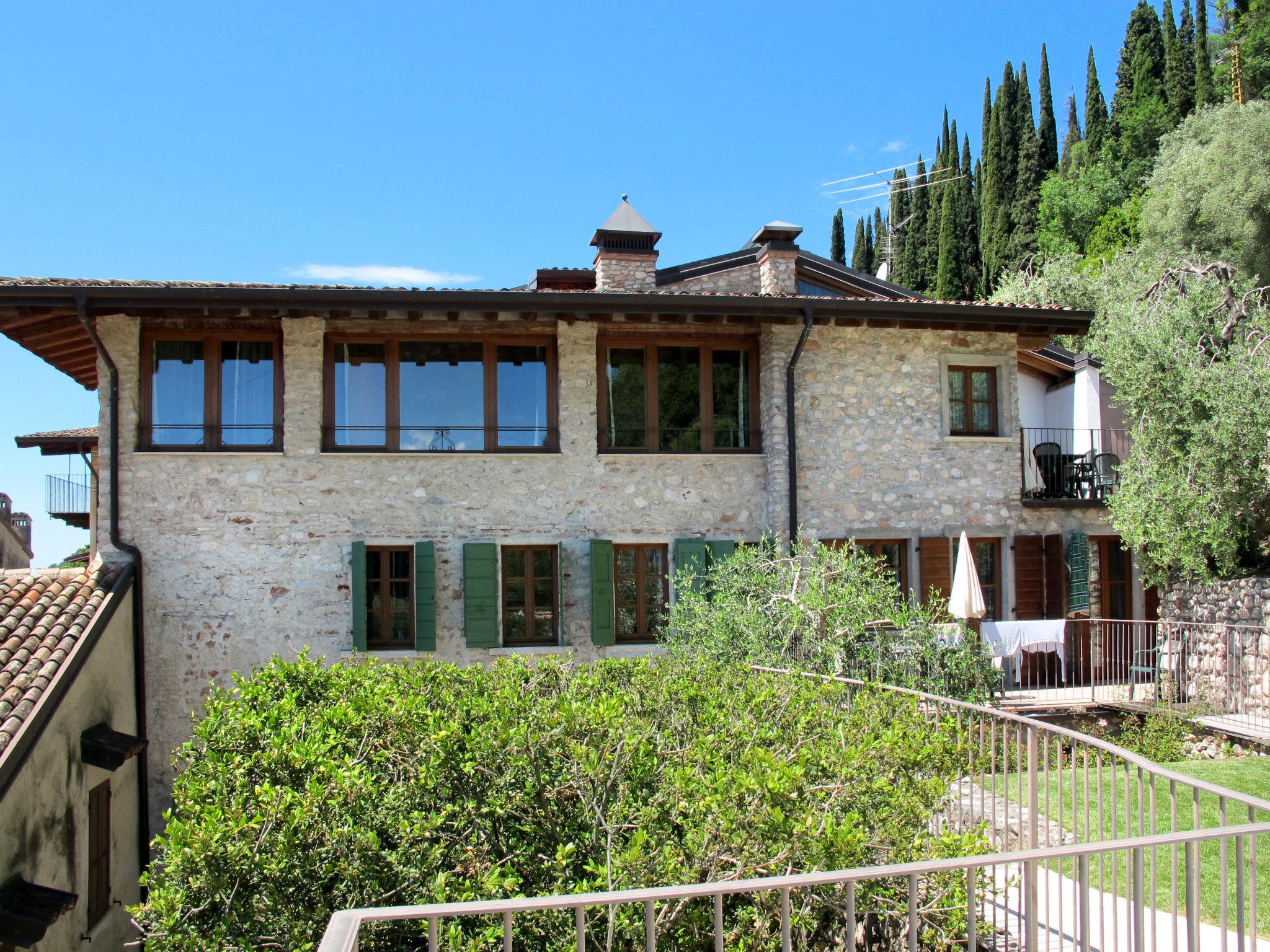 Foto 7 - Appartamento con 2 camere da letto a Toscolano Maderno con piscina e giardino