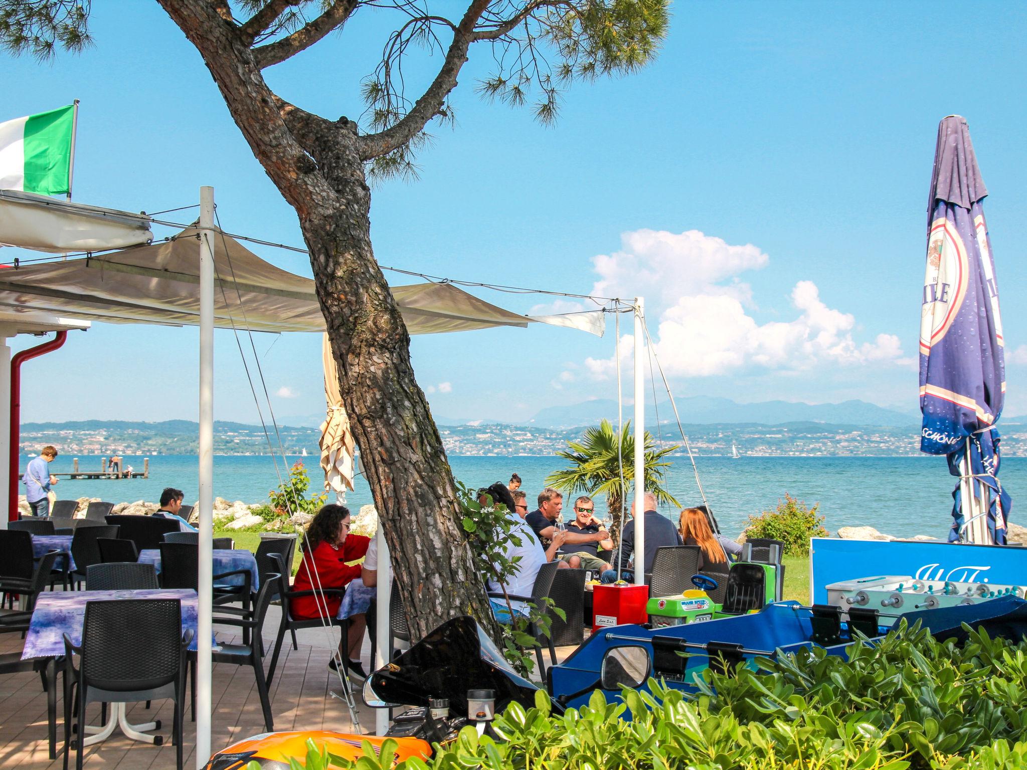 Photo 36 - Maison de 1 chambre à Sirmione avec piscine et jardin