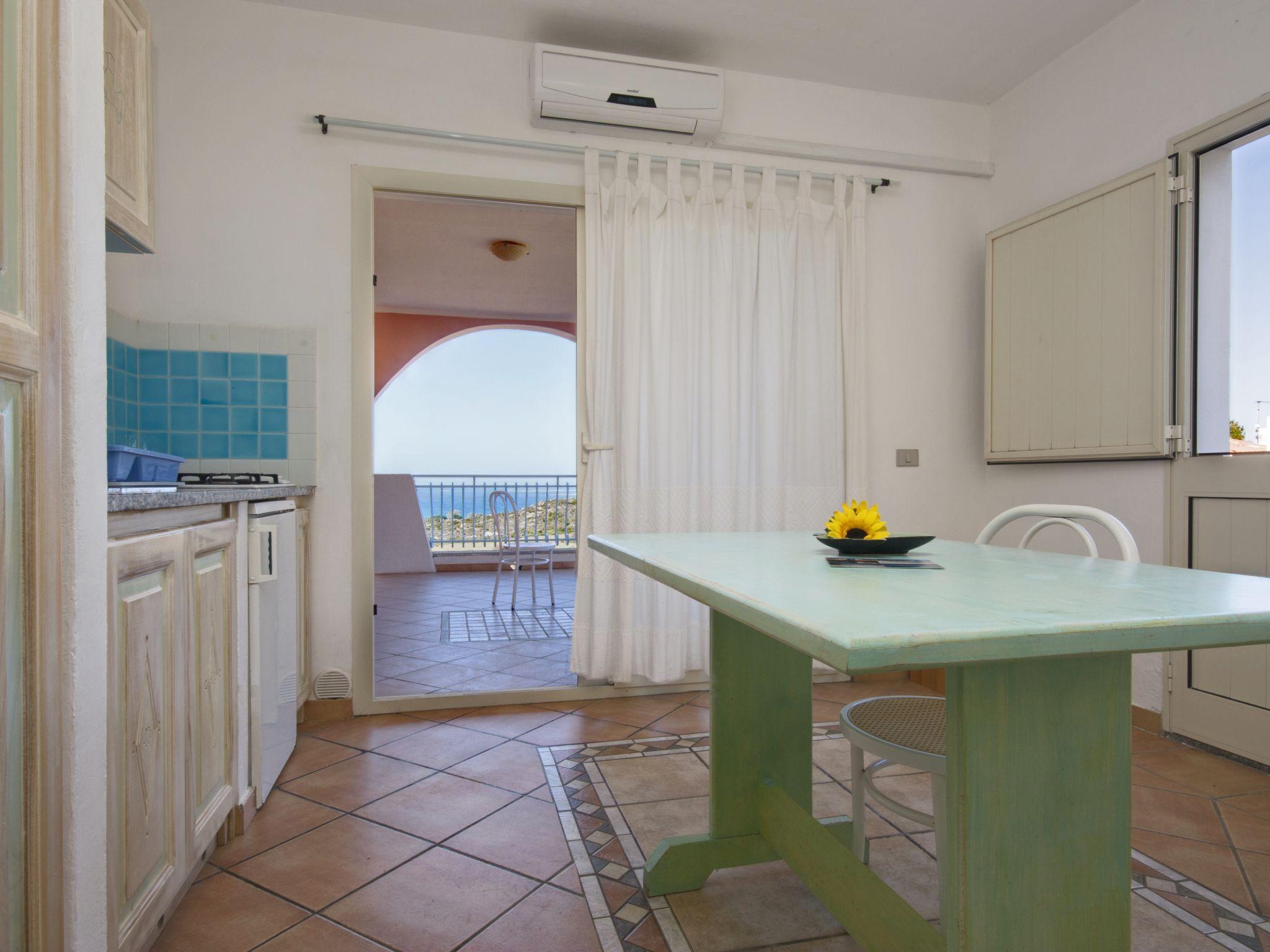 Foto 6 - Apartamento de 1 habitación en San Teodoro con piscina y vistas al mar