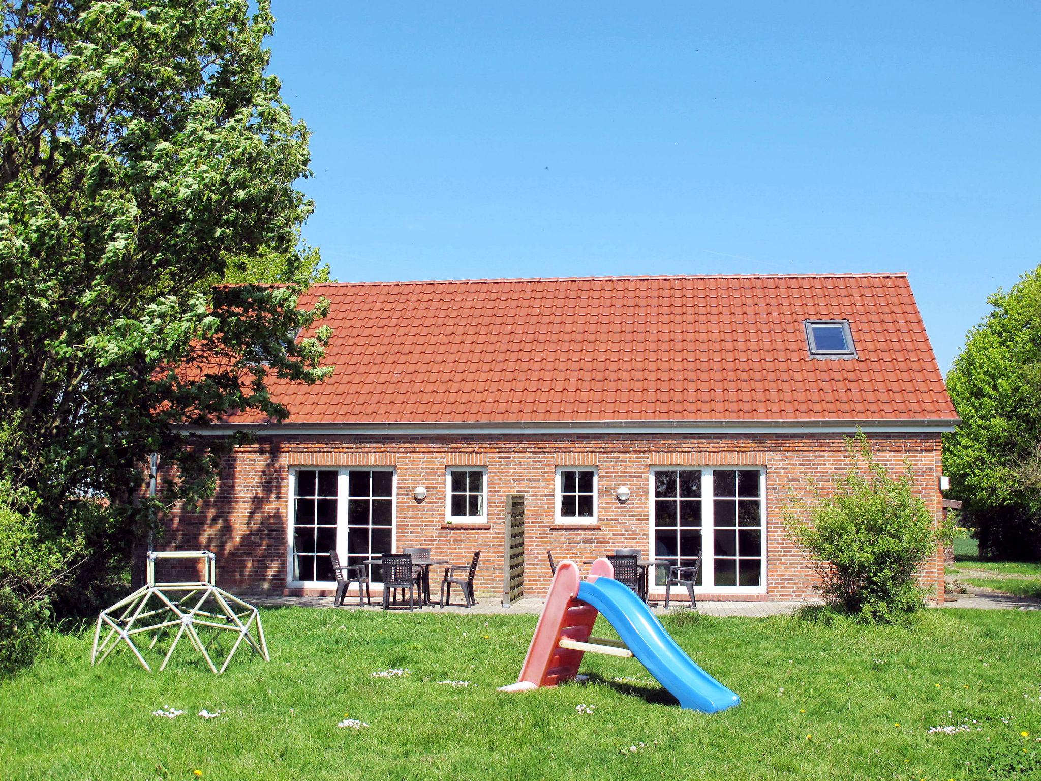 Photo 2 - Maison de 4 chambres à Bunde avec jardin et terrasse