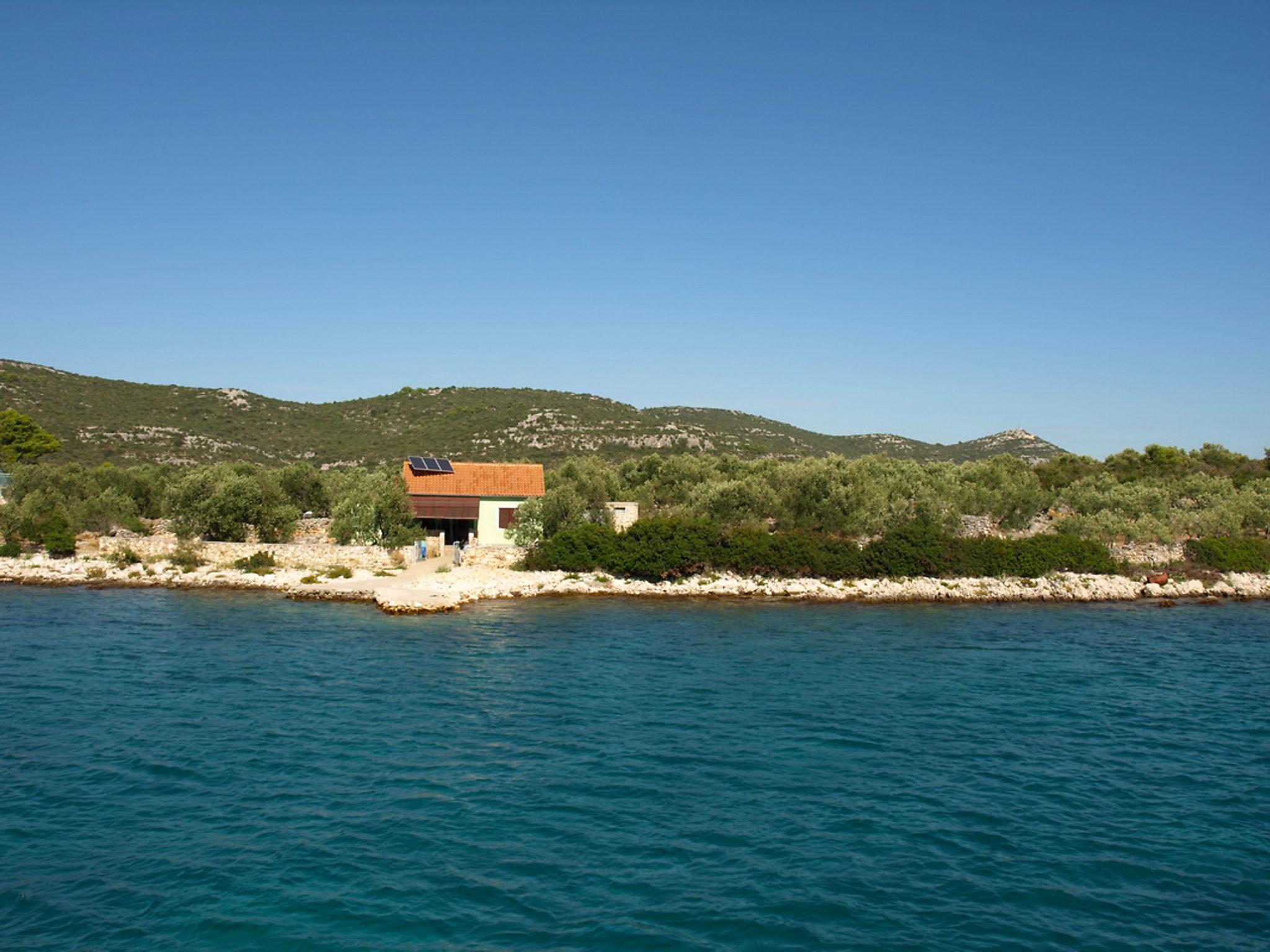 Foto 14 - Casa con 2 camere da letto a Pašman con terrazza e vista mare