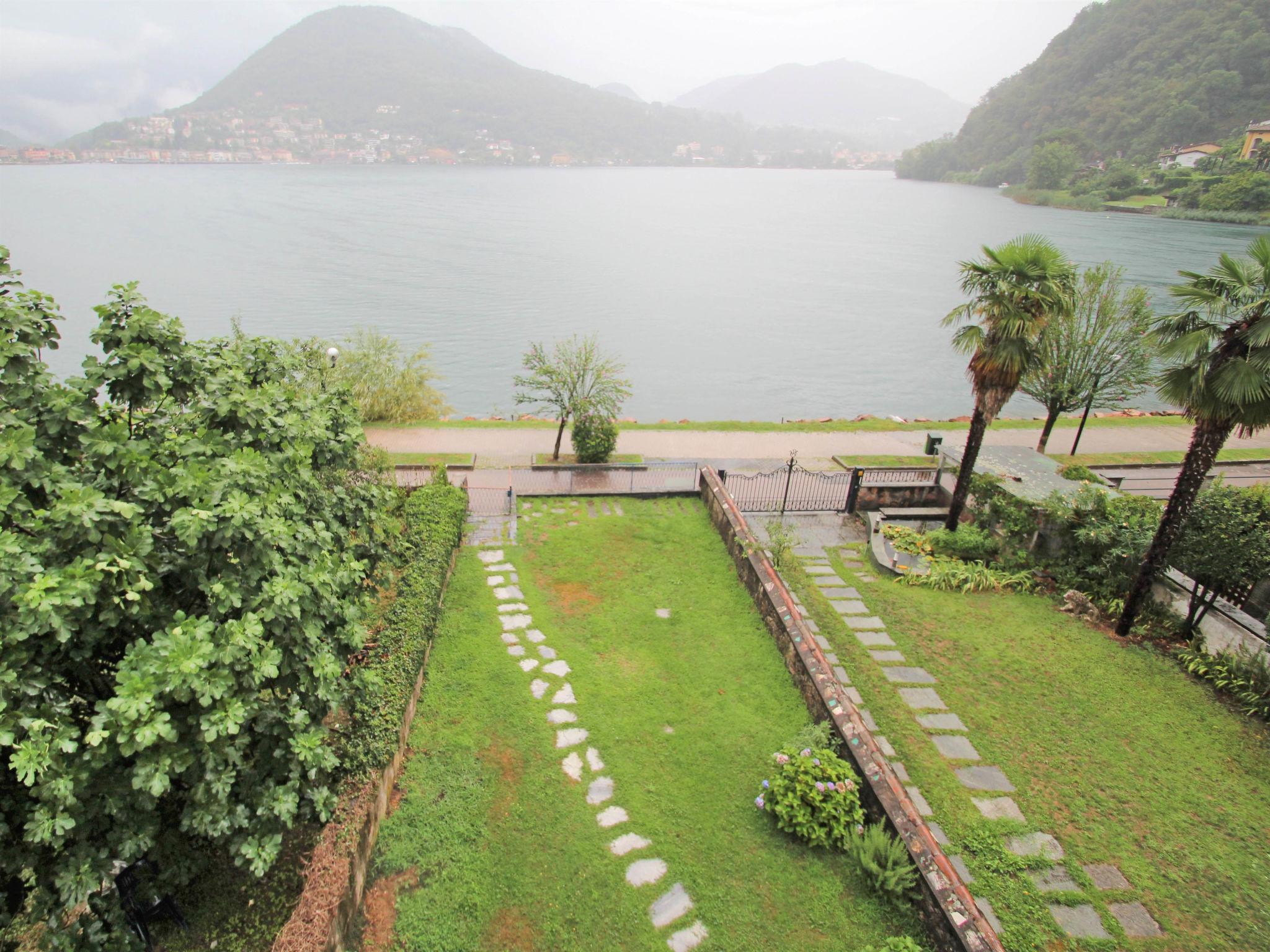 Foto 1 - Apartamento de 2 quartos em Lavena Ponte Tresa com jardim e vista para a montanha