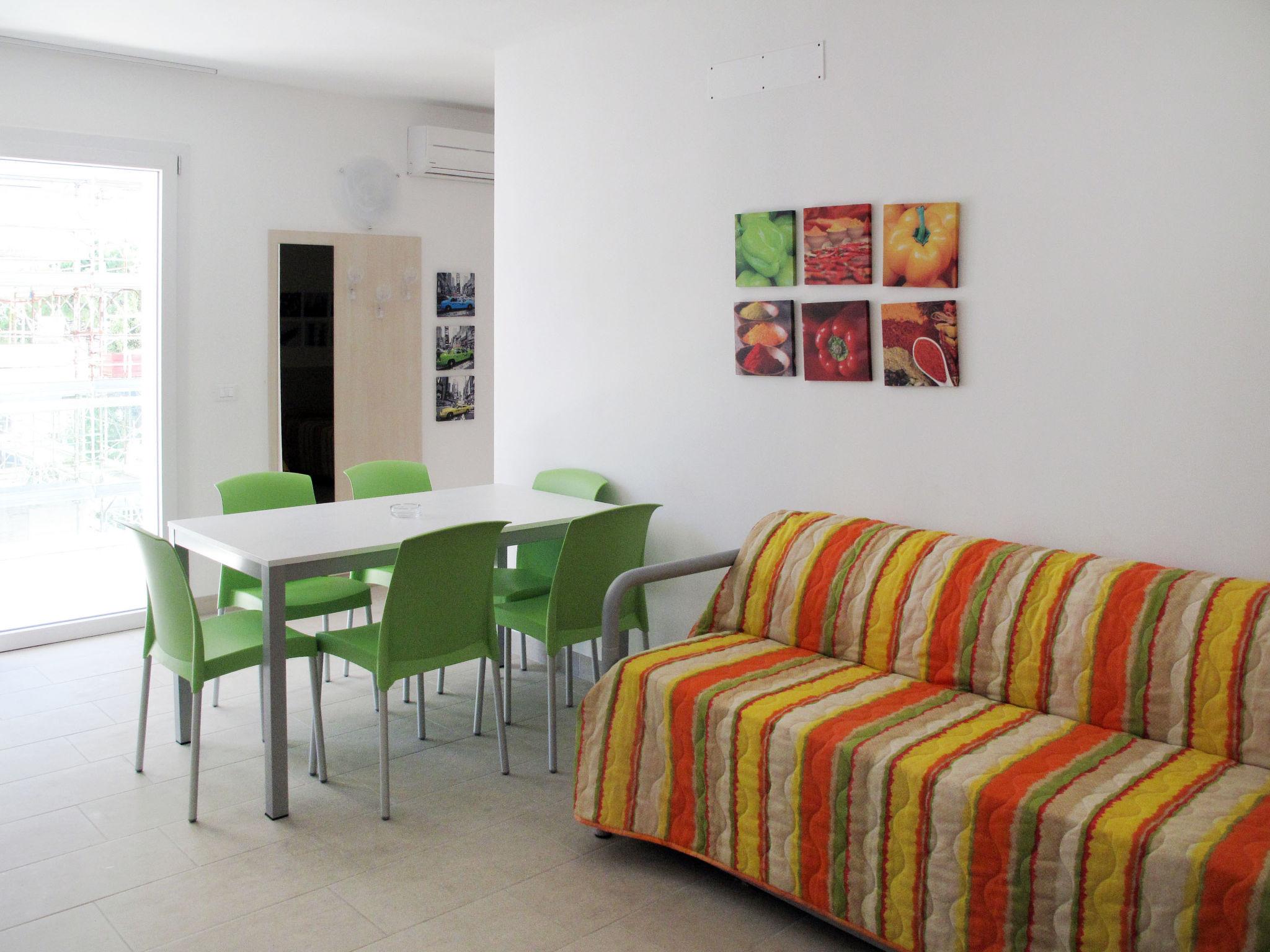 Foto 5 - Apartamento de 1 habitación en Lignano Sabbiadoro con piscina y vistas al mar
