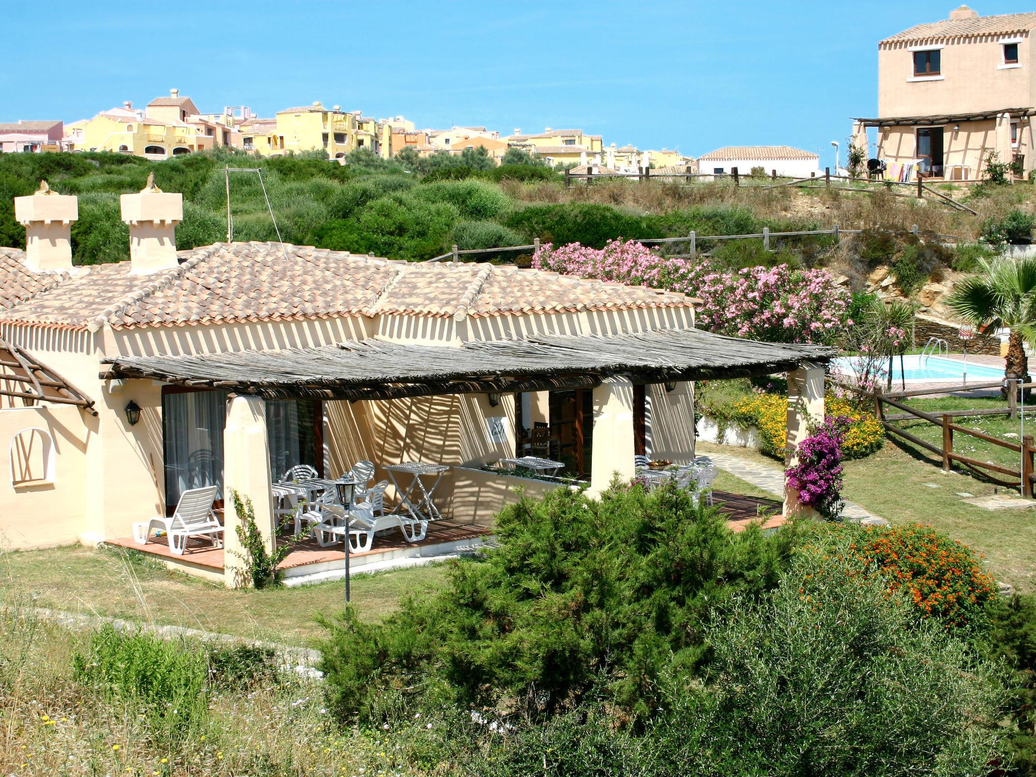 Photo 20 - Maison de 1 chambre à Stintino avec jardin et vues à la mer