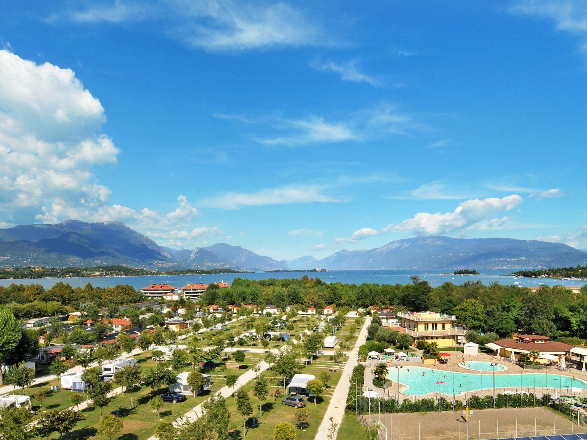 Photo 21 - Appartement de 2 chambres à Manerba del Garda avec piscine et vues sur la montagne