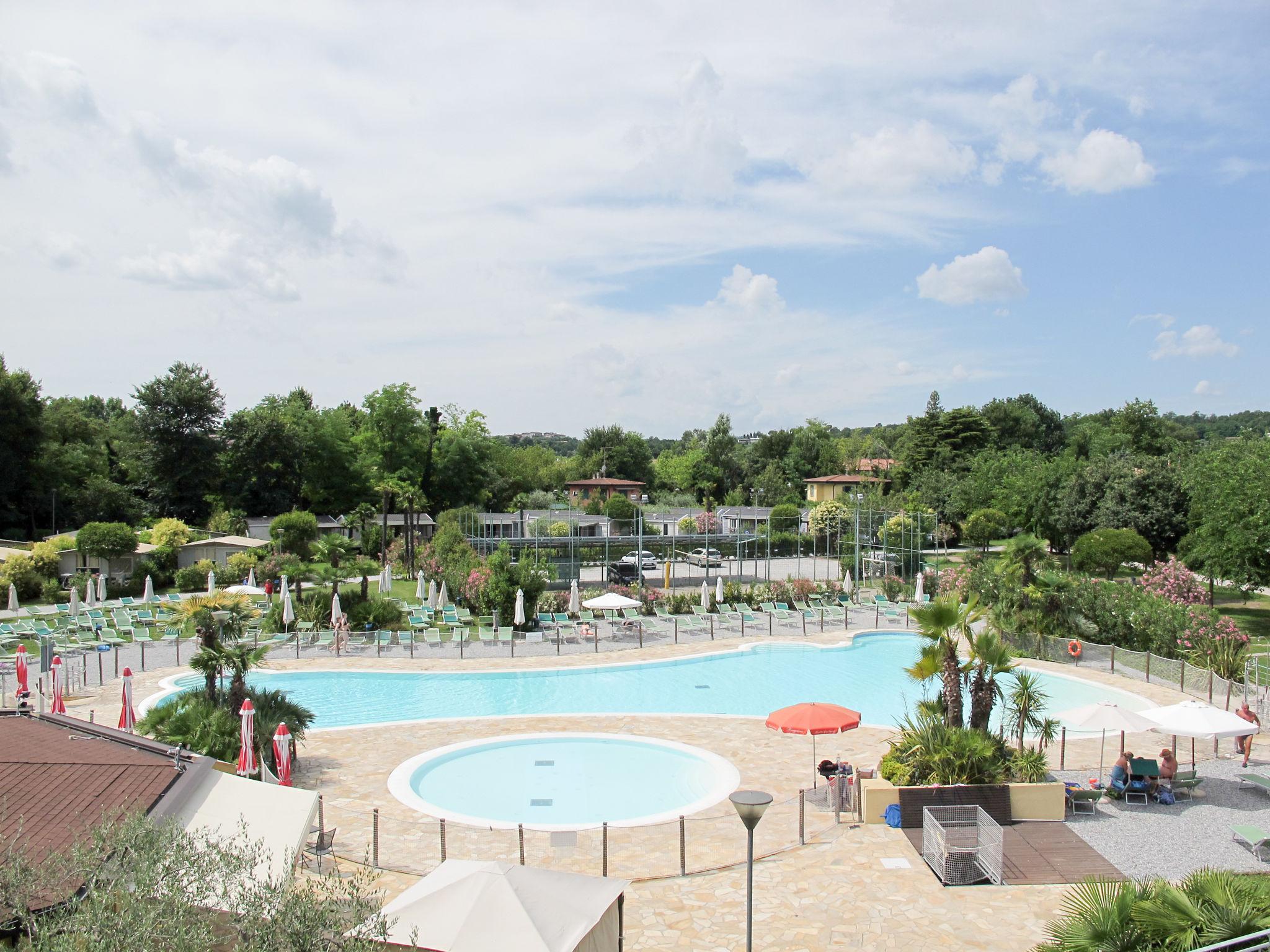 Foto 20 - Apartamento de 3 quartos em Manerba del Garda com piscina e vista para a montanha