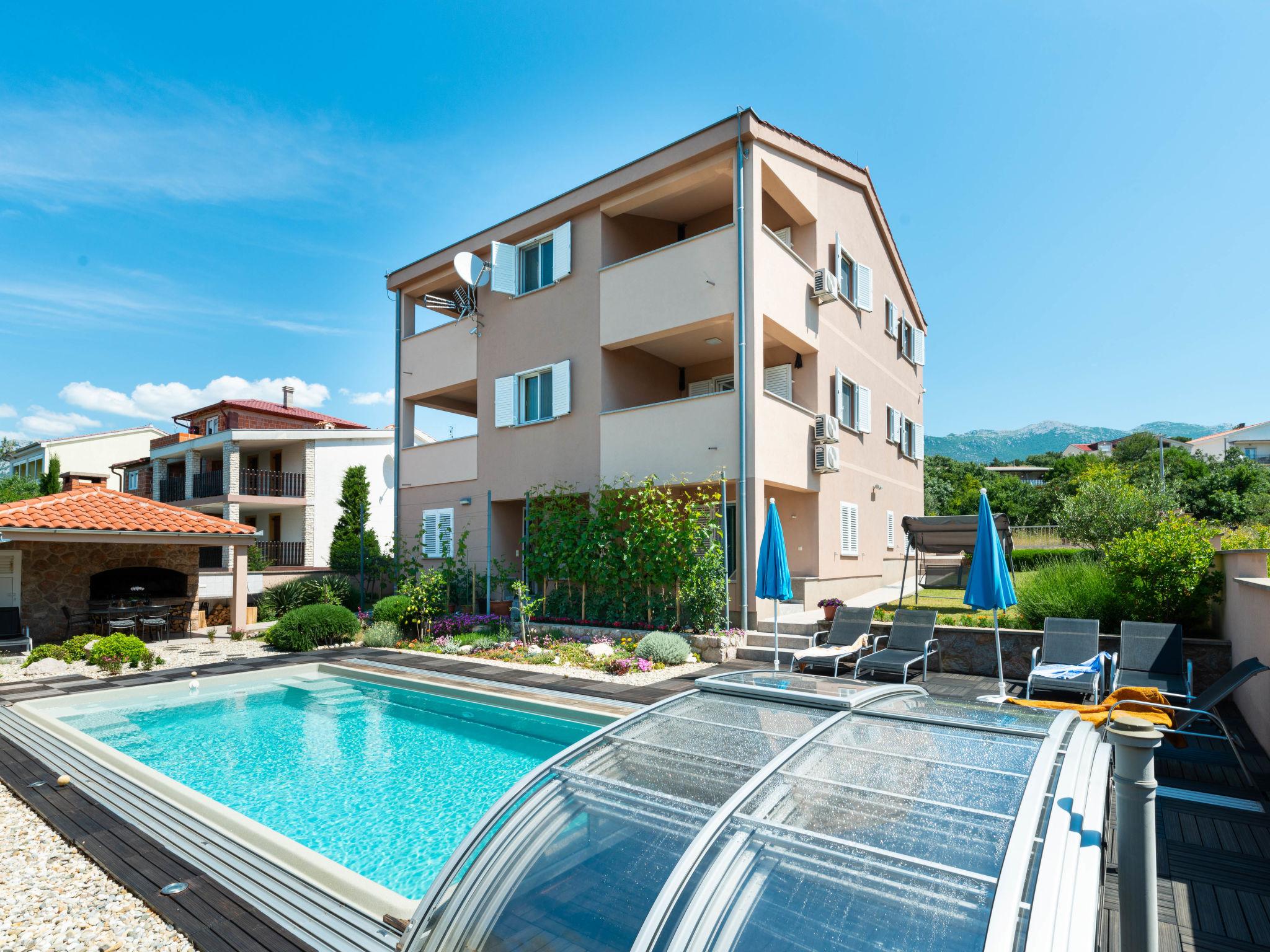 Photo 2 - Appartement de 1 chambre à Jasenice avec piscine et vues à la mer