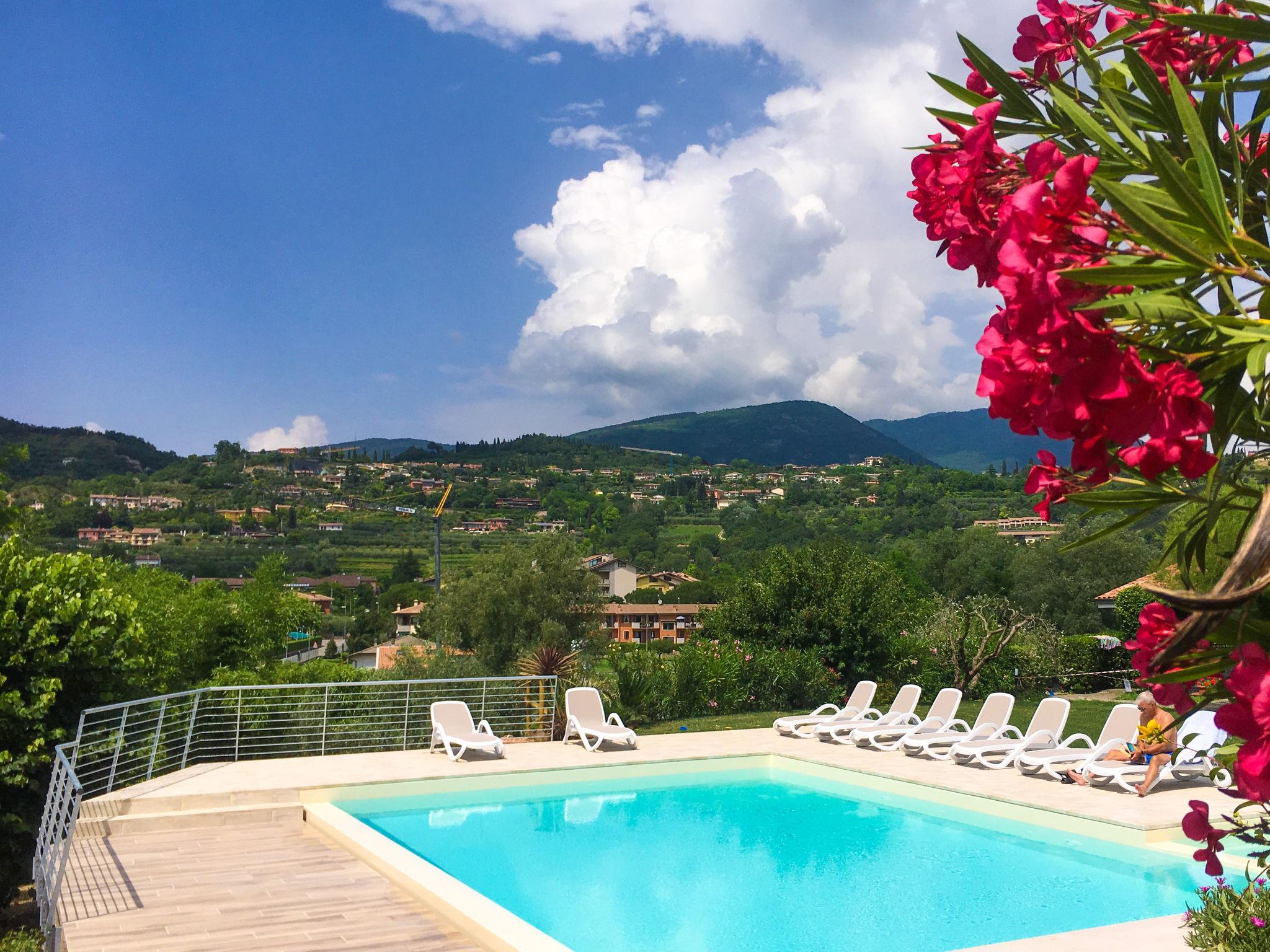 Foto 18 - Apartamento de 1 habitación en Garda con piscina y vistas a la montaña