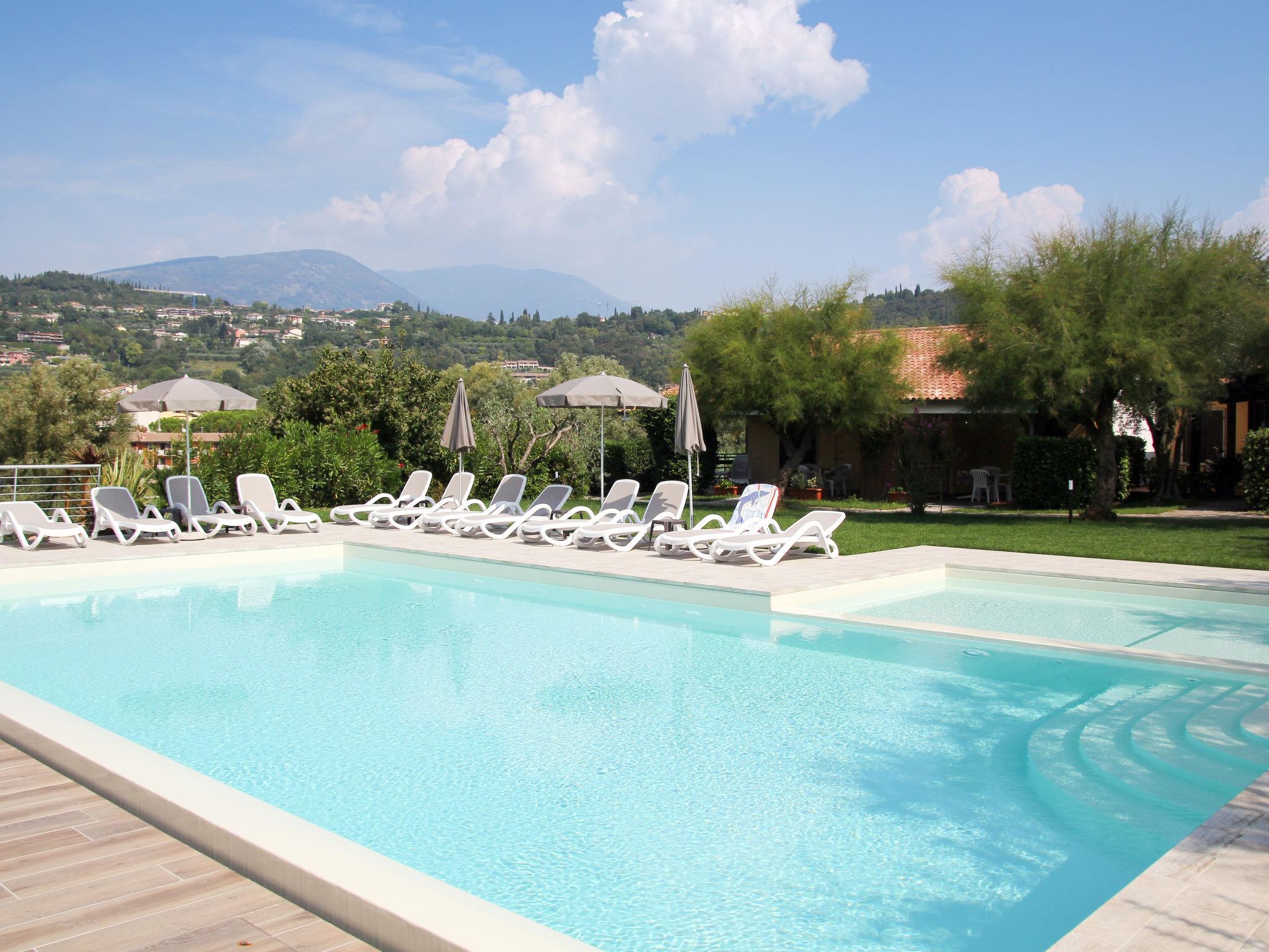 Foto 17 - Apartment mit 1 Schlafzimmer in Garda mit schwimmbad und blick auf die berge