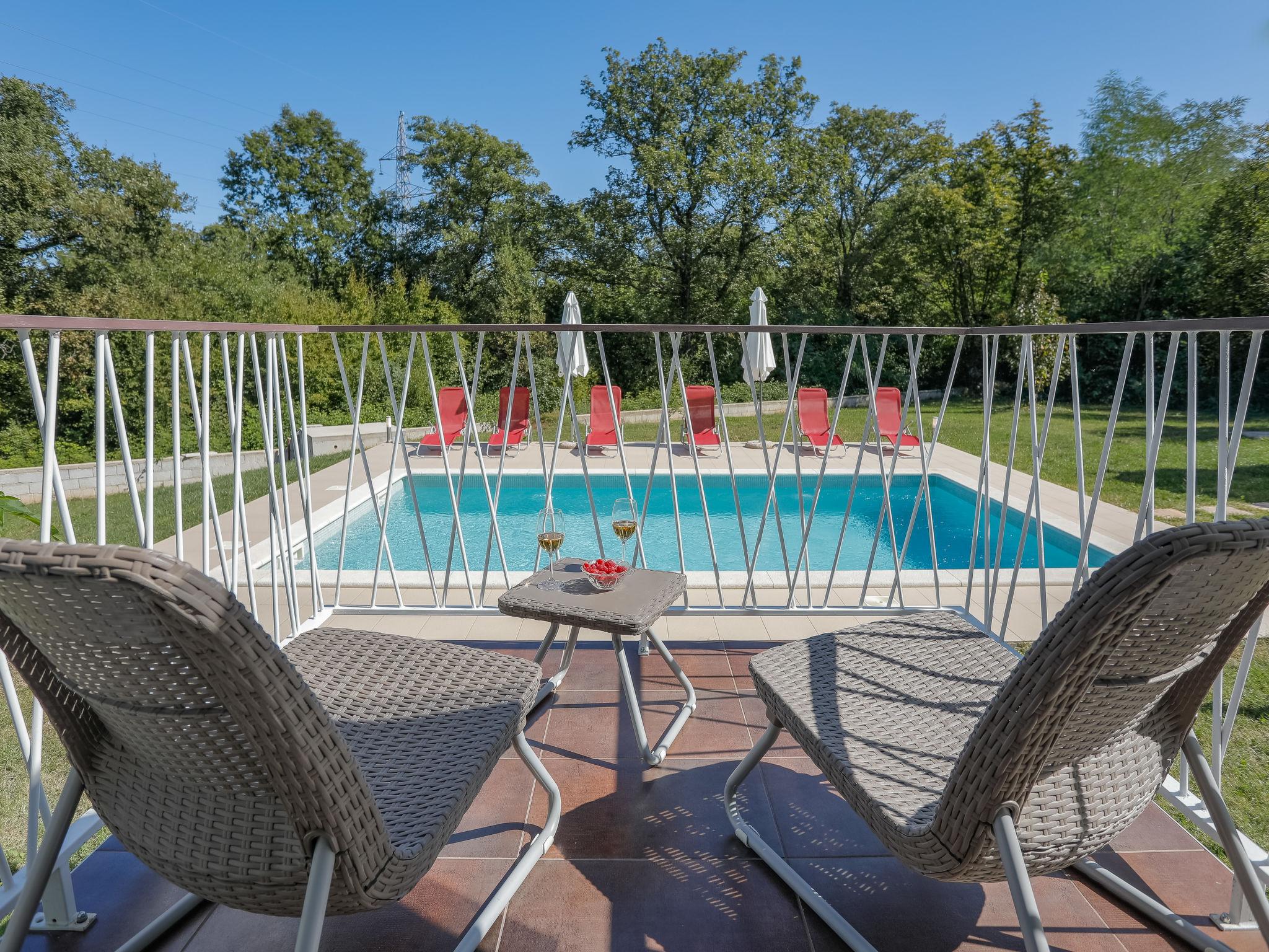 Photo 20 - Maison de 3 chambres à Raša avec piscine privée et vues à la mer