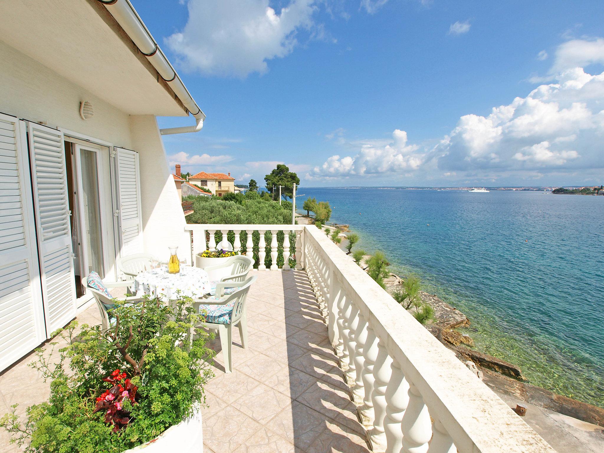 Photo 2 - Maison de 3 chambres à Kali avec terrasse et vues à la mer