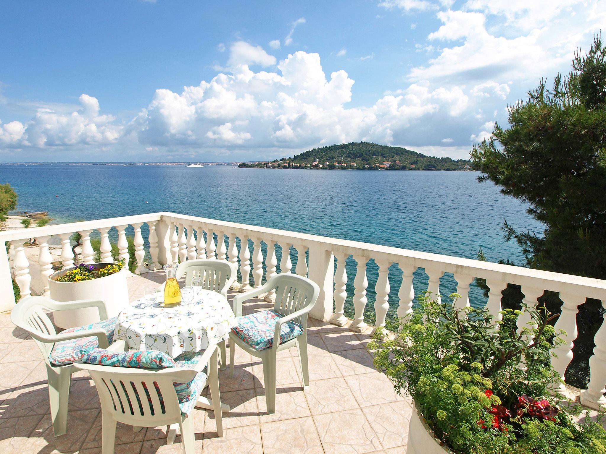 Photo 1 - Maison de 3 chambres à Kali avec terrasse et vues à la mer