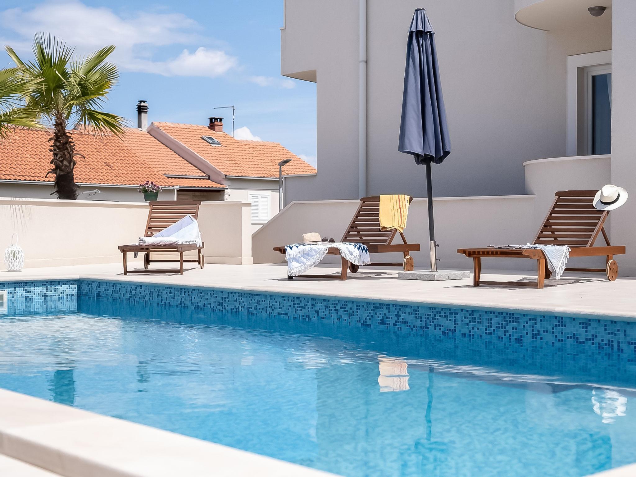 Foto 33 - Apartamento de 2 quartos em Sutivan com piscina e vistas do mar