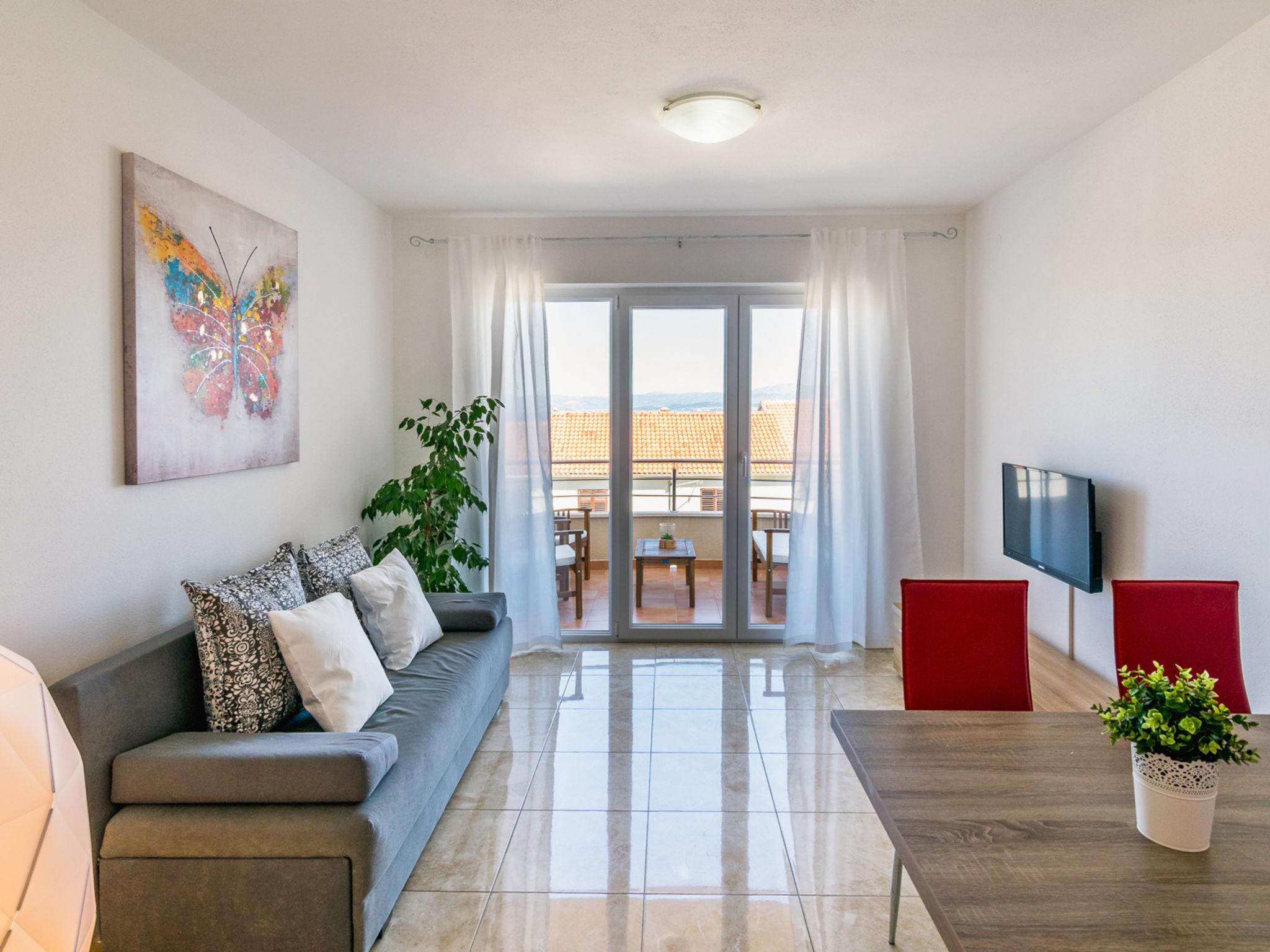 Foto 7 - Apartamento de 2 quartos em Sutivan com piscina e vistas do mar