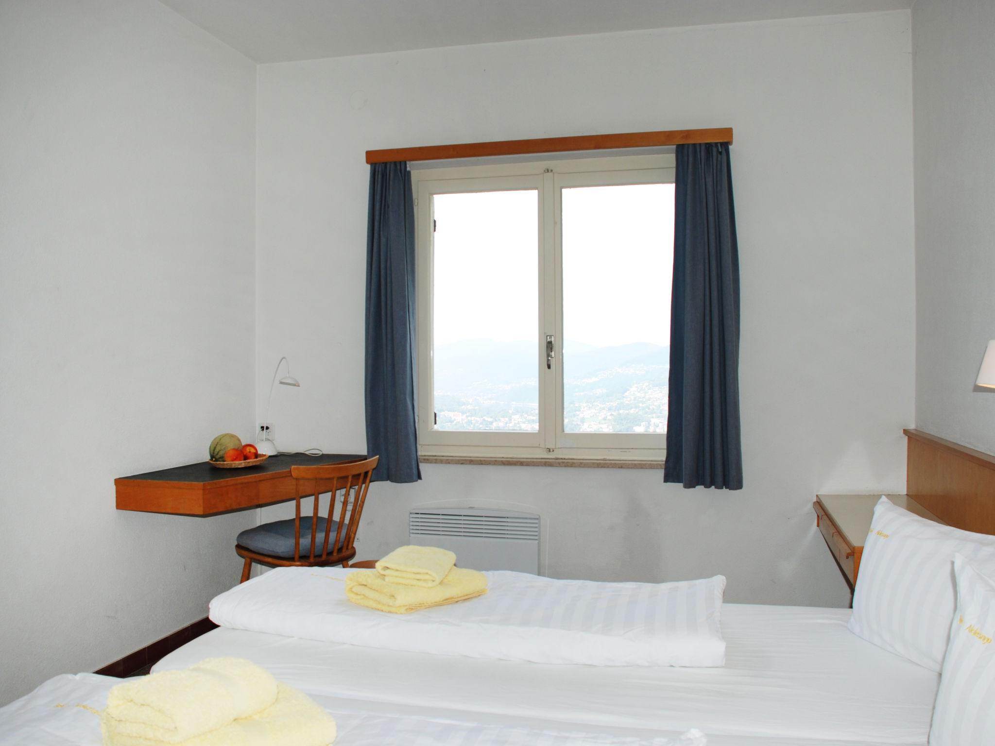 Photo 21 - Maison de 1 chambre à Lugano avec piscine privée et vues sur la montagne