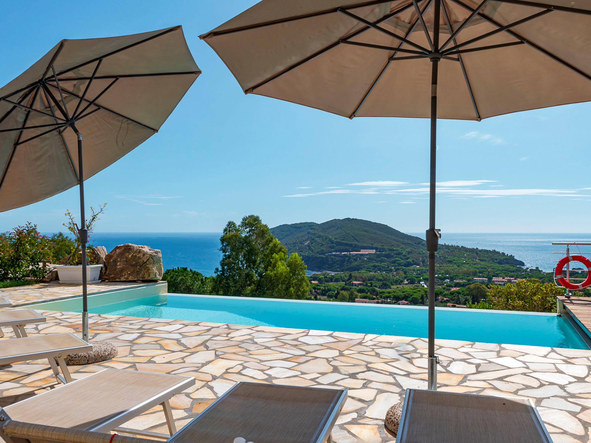 Photo 3 - Maison de 2 chambres à Capoliveri avec piscine et vues à la mer