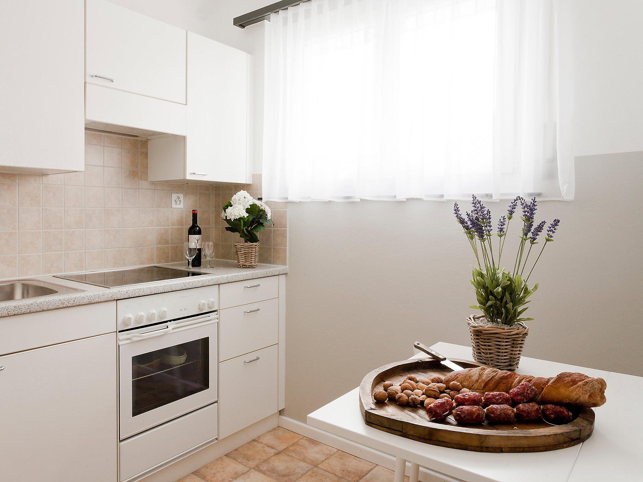 Foto 9 - Apartamento de 1 habitación en Ascona con jardín