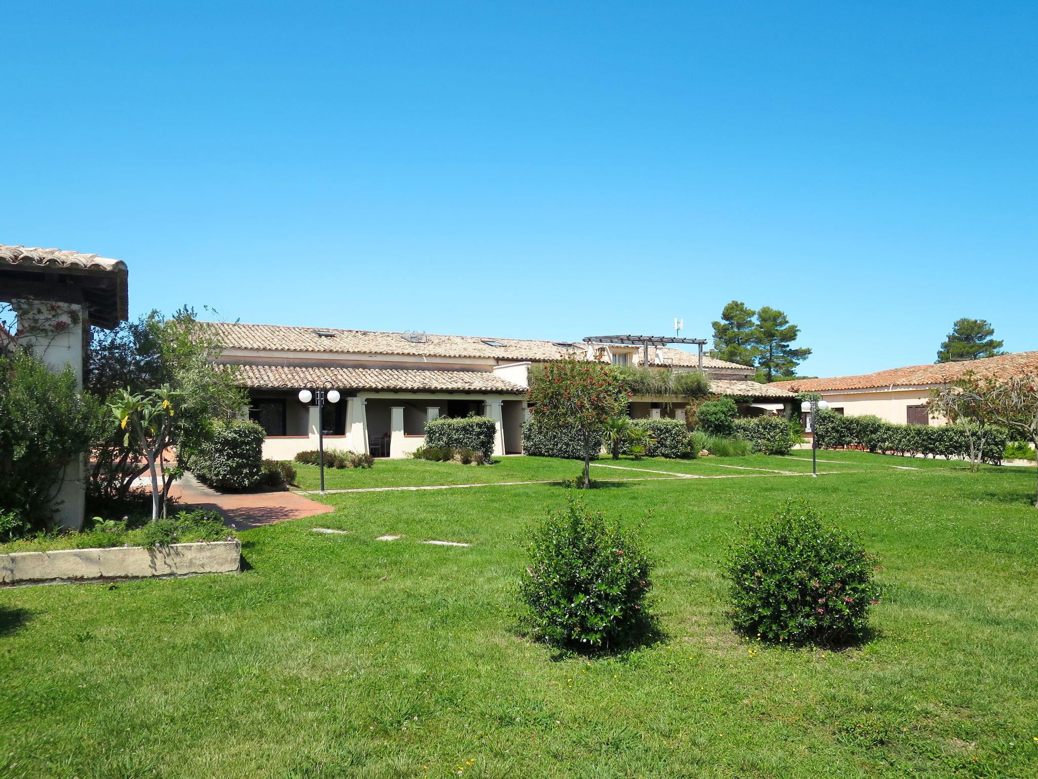 Photo 1 - Maison de 1 chambre à San Teodoro avec jardin et terrasse