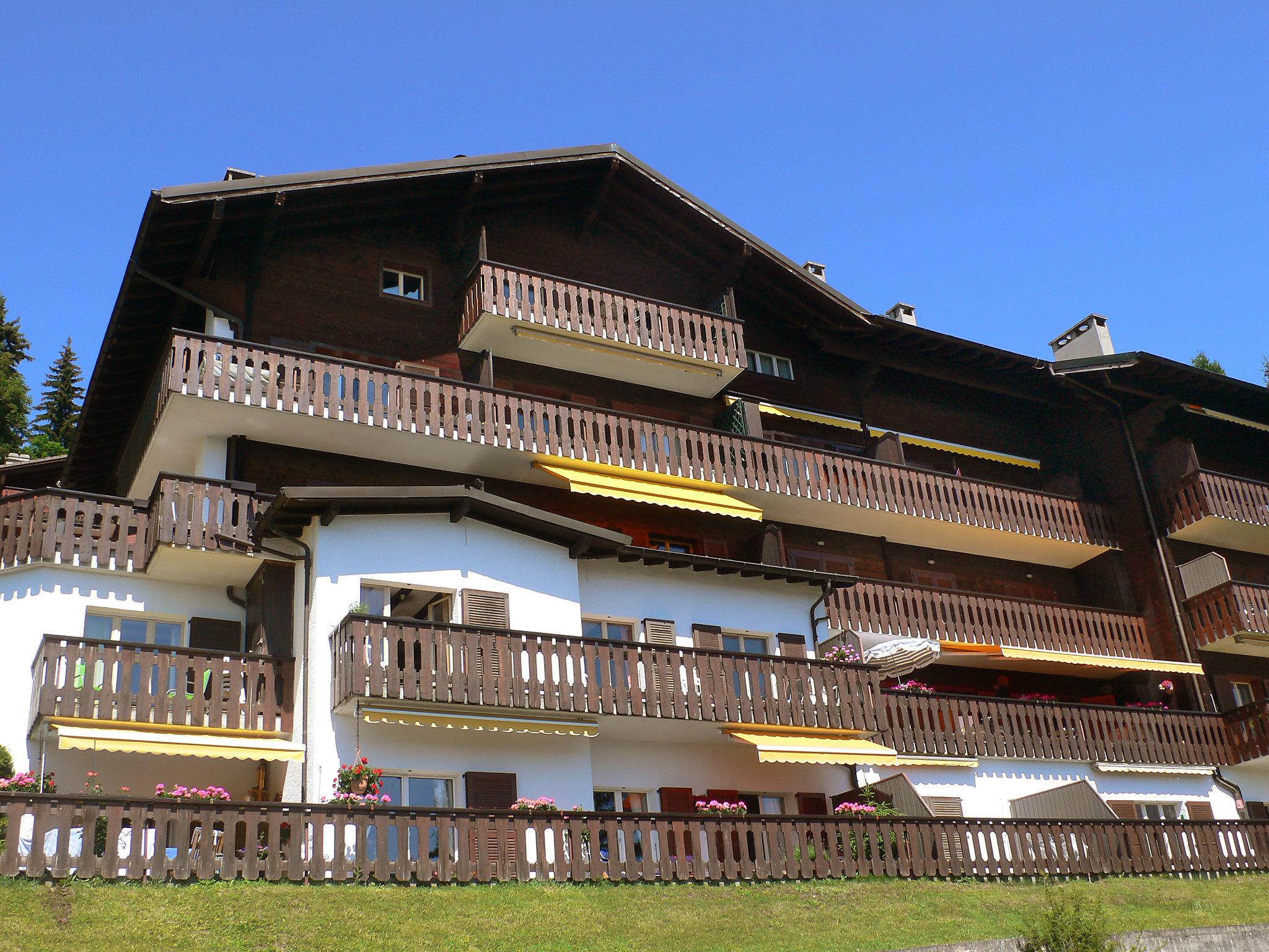 Photo 1 - Appartement de 2 chambres à Ollon avec piscine et vues sur la montagne